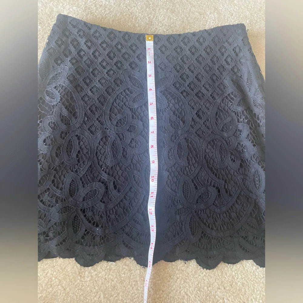 Free People Black Lace mini Skirt. Lined. Side zip.‎ Women size 2.